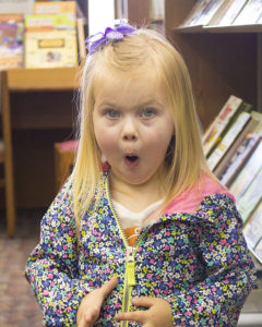 child making surprised face